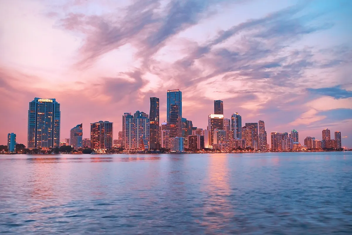 Miami skyline across the water at sunset