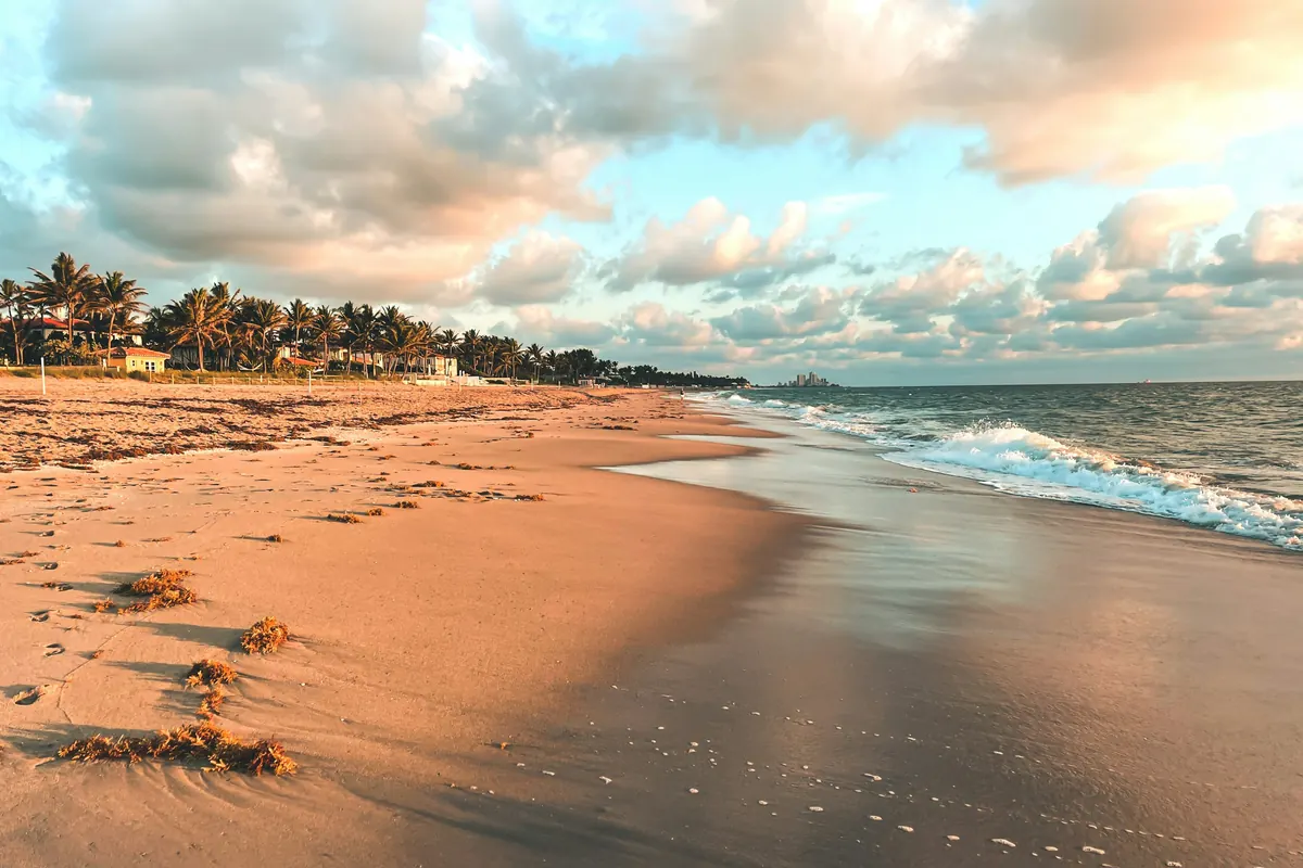 Wide sandy beach at sunset