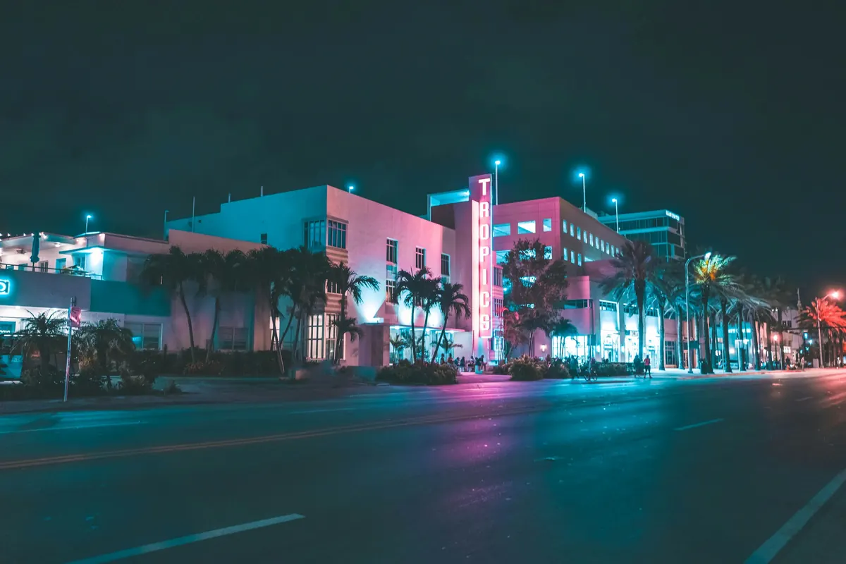 Ocean Drive art deco hotels lit in neon at night